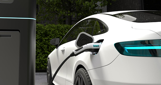 Electric Vehicle plugged in to chager