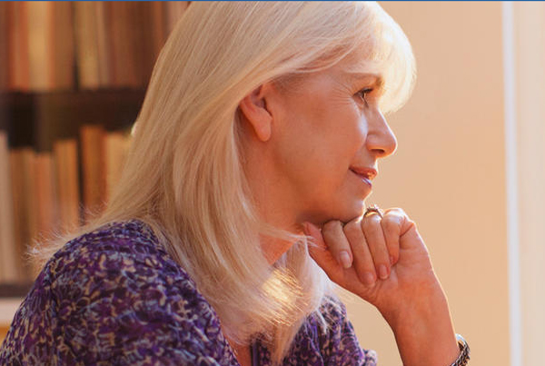 Woman looking at computer screen